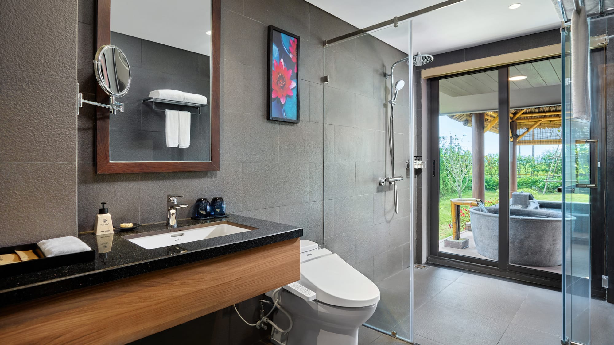 a bathroom with a shower and a toilet