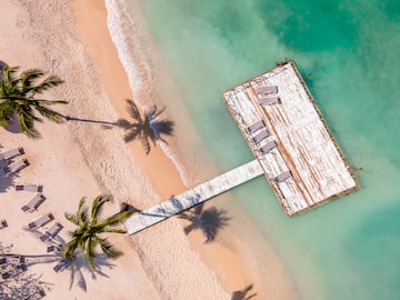 a dock on a beach