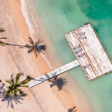 a dock on a beach