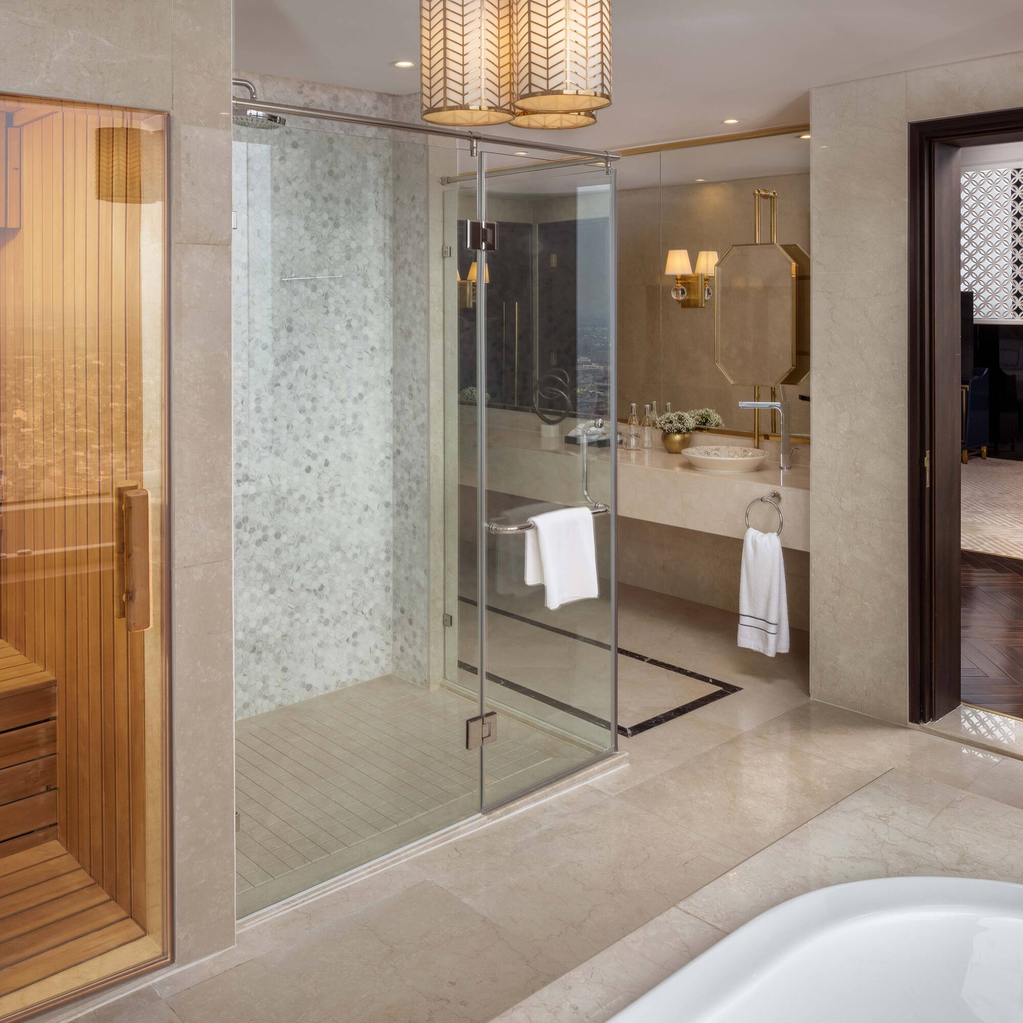 a bathroom with a bathtub and a shower