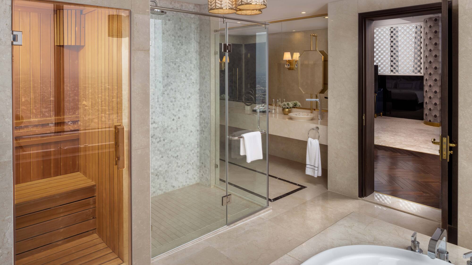 a bathroom with a bathtub and a shower