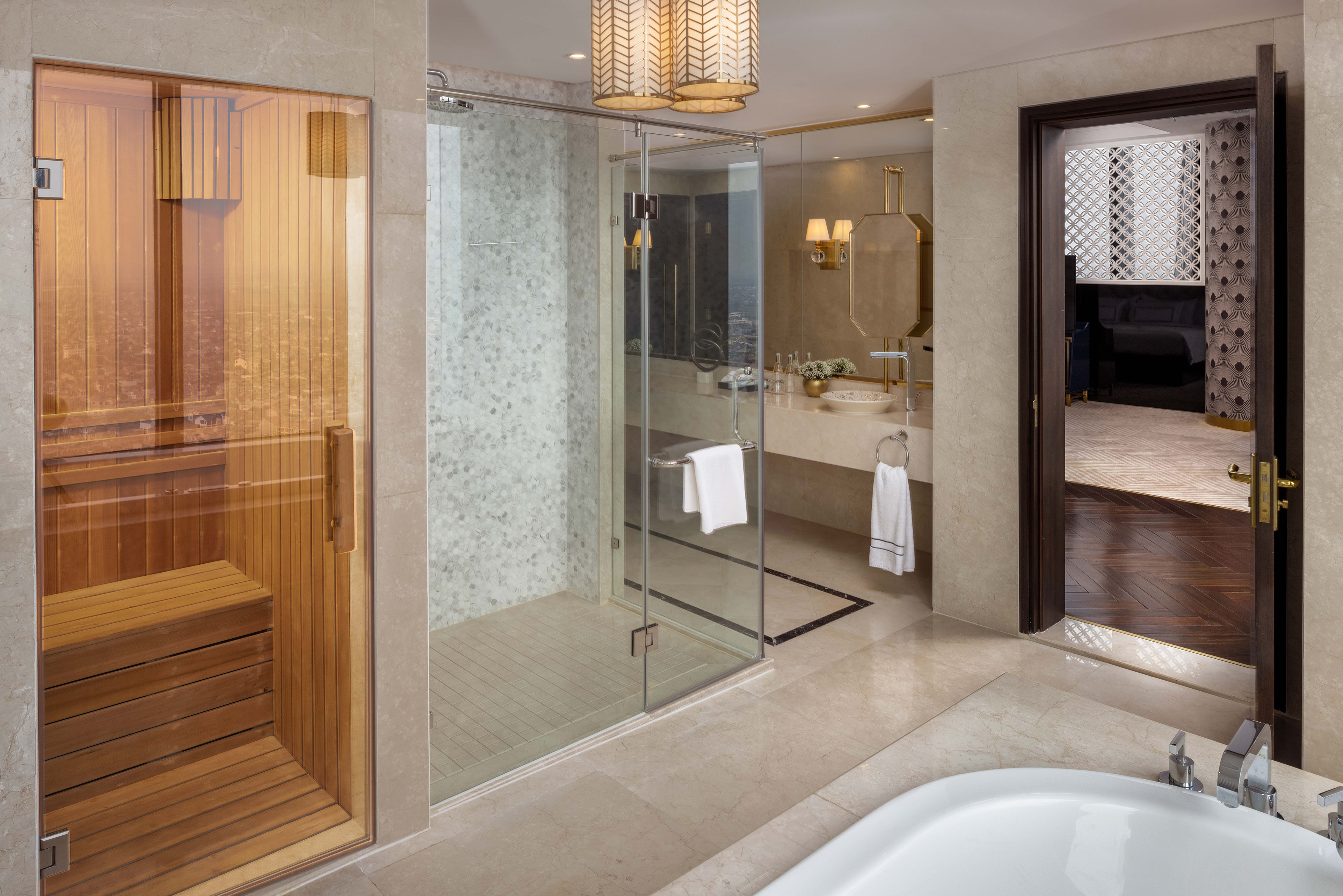 a bathroom with a bathtub and a shower