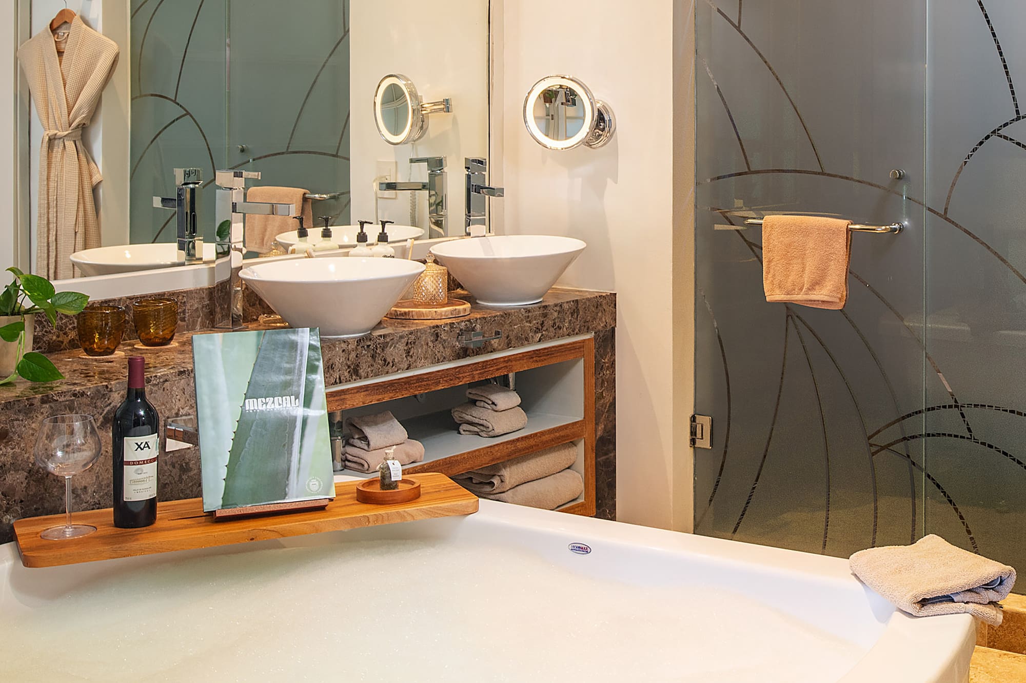 a bathroom with a tub and sink