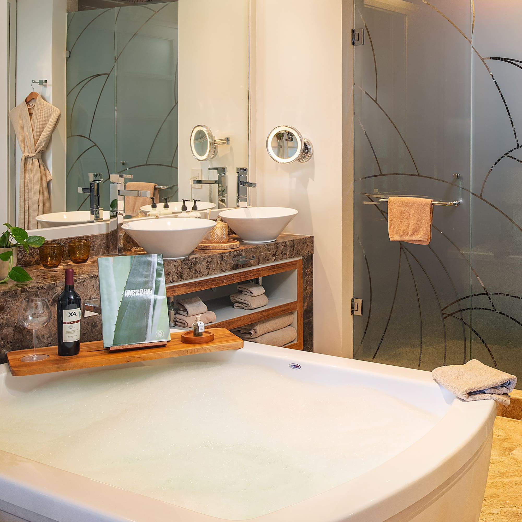 a bathroom with a tub and sink