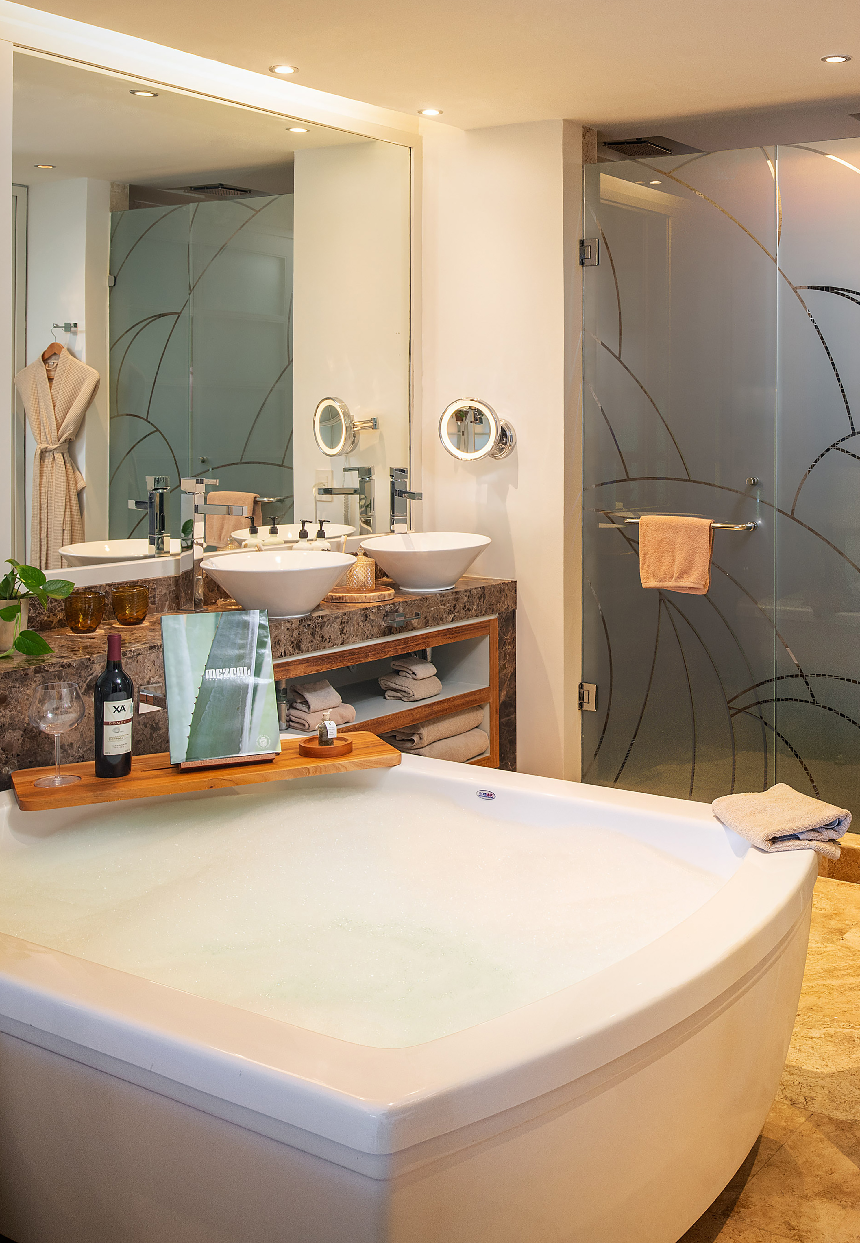 a bathroom with a tub and sink