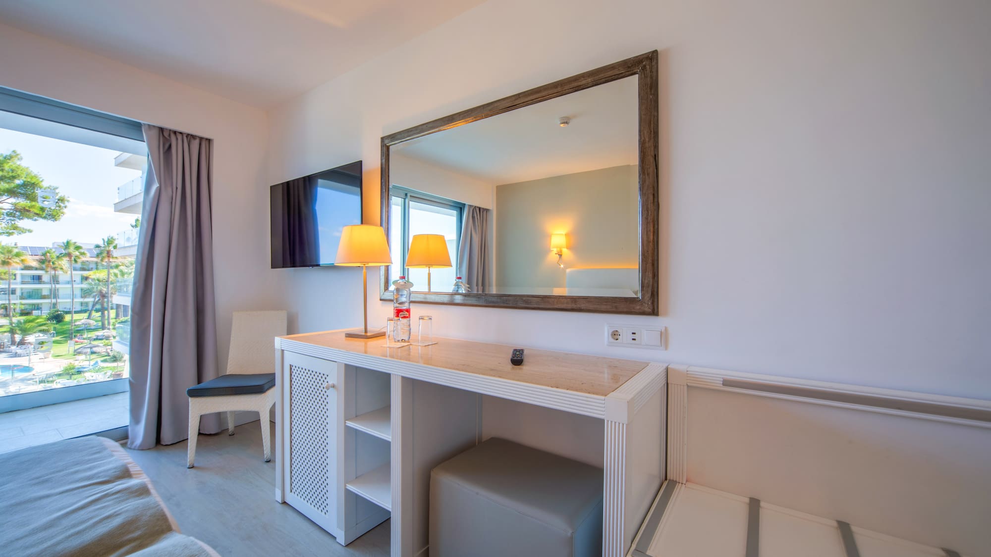 a room with a mirror and a table