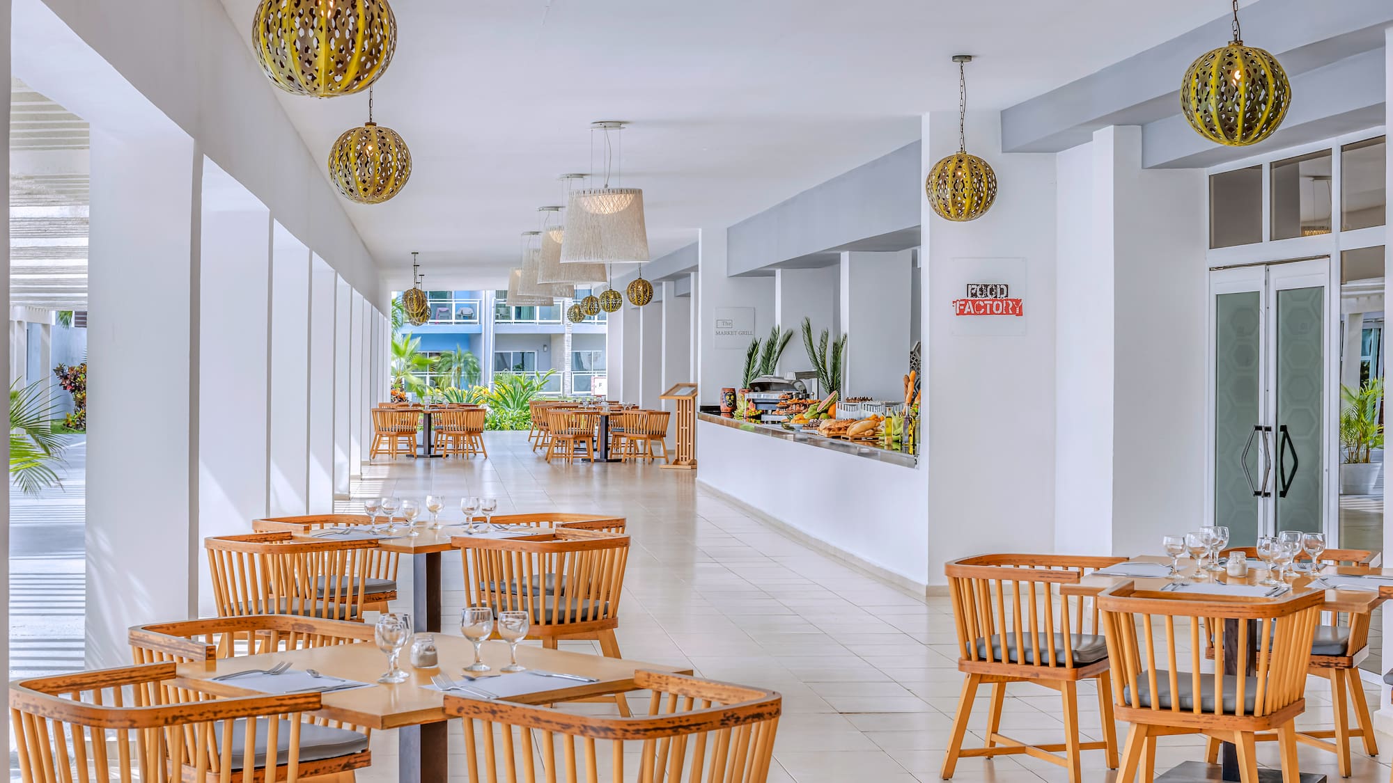 a restaurant with tables and chairs