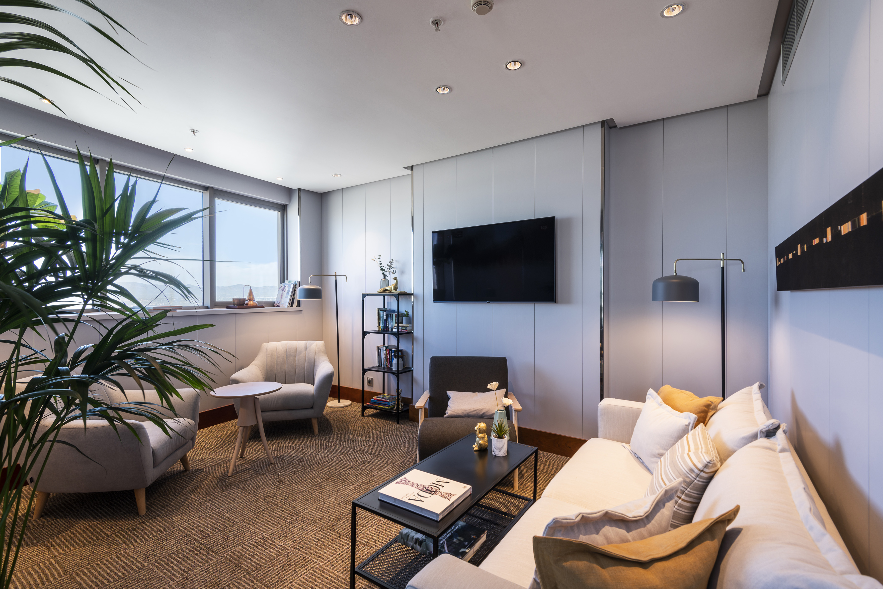 a room with a couch and a tv