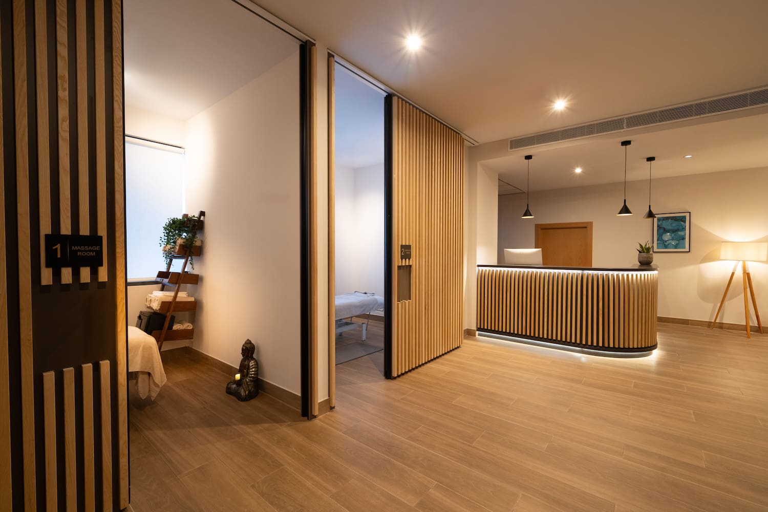 a room with a bed and a desk