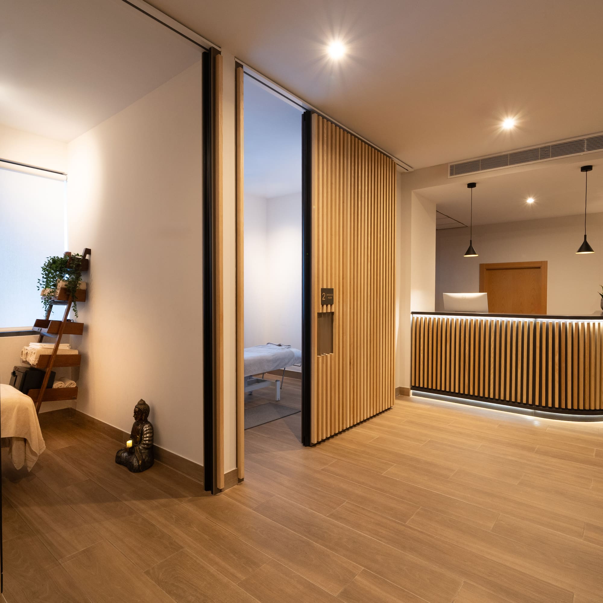 a room with a bed and a desk