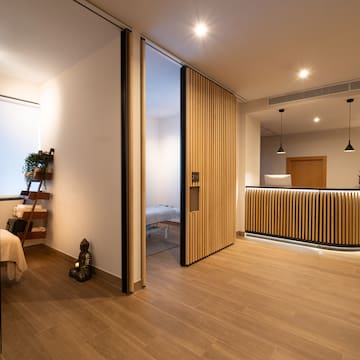 a room with a bed and a desk