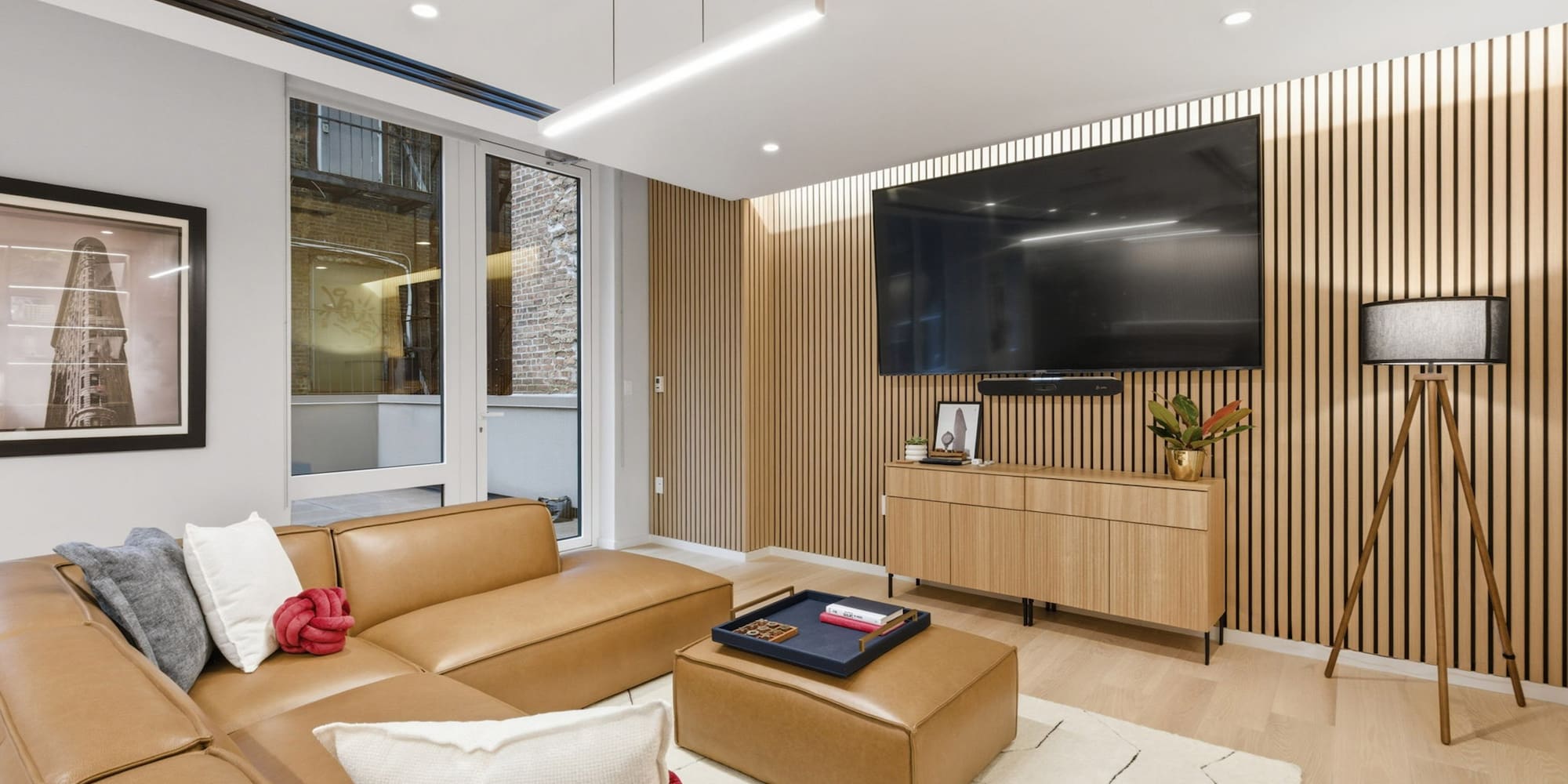 a living room with a television and a couch