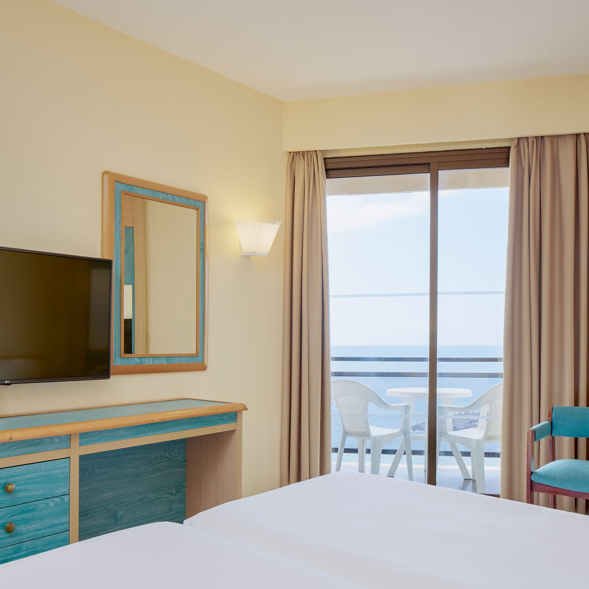 a room with a television and a table