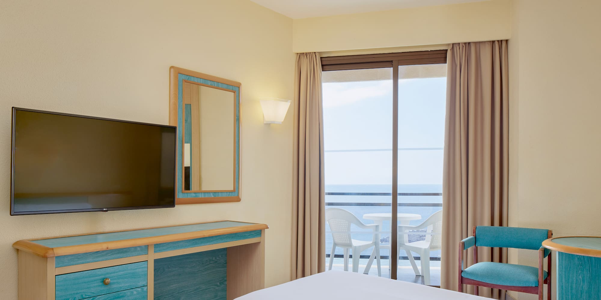 a room with a television and a table