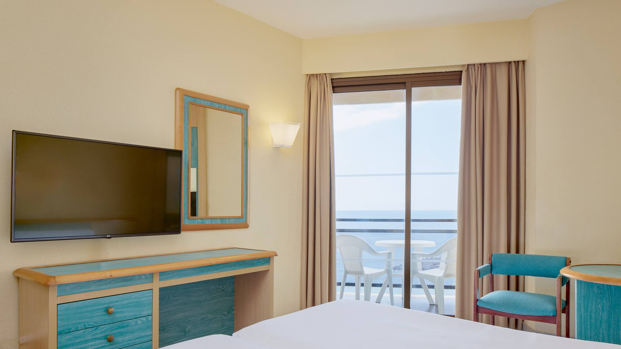 a room with a television and a table