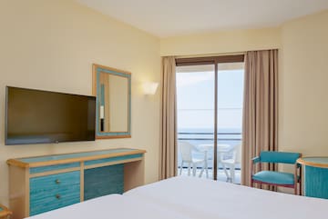 a room with a television and a table