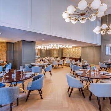 a room with tables and chairs