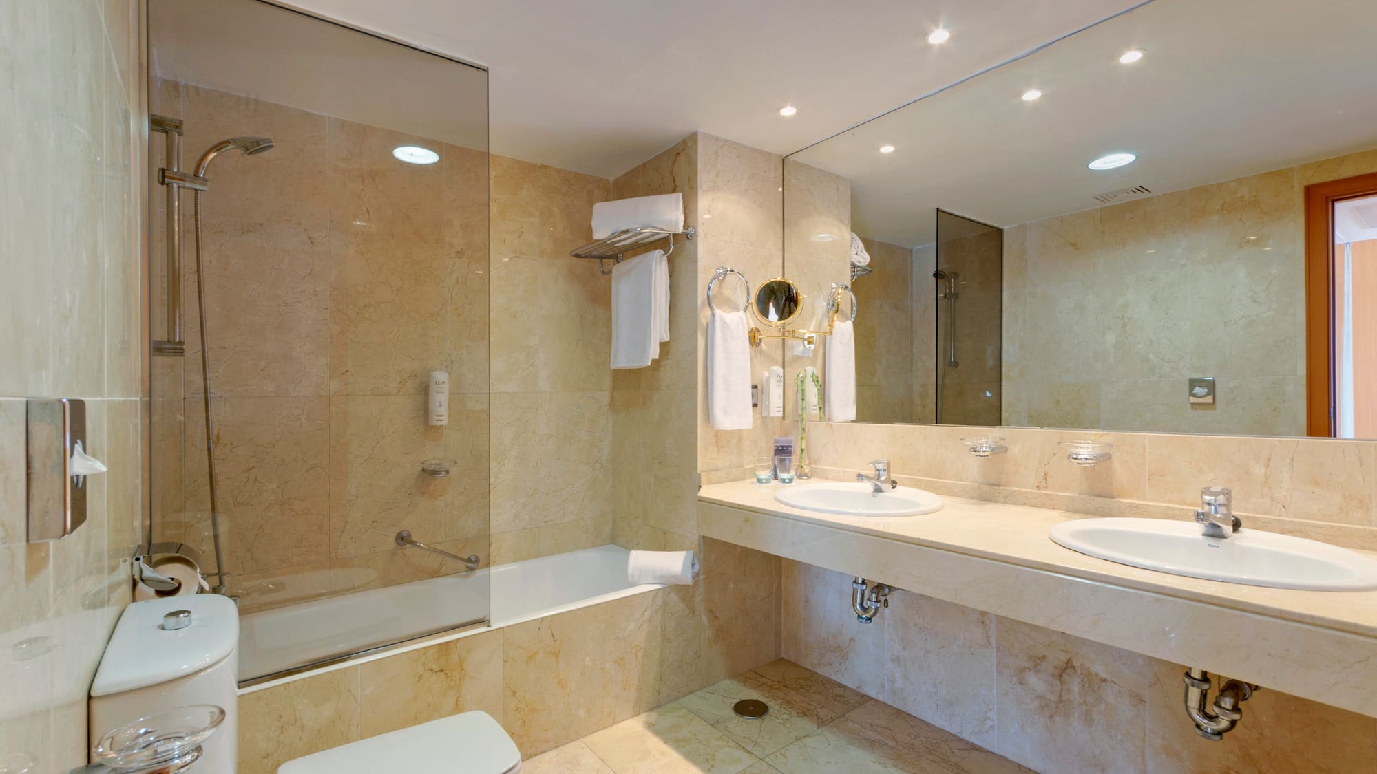 a bathroom with a shower and sink