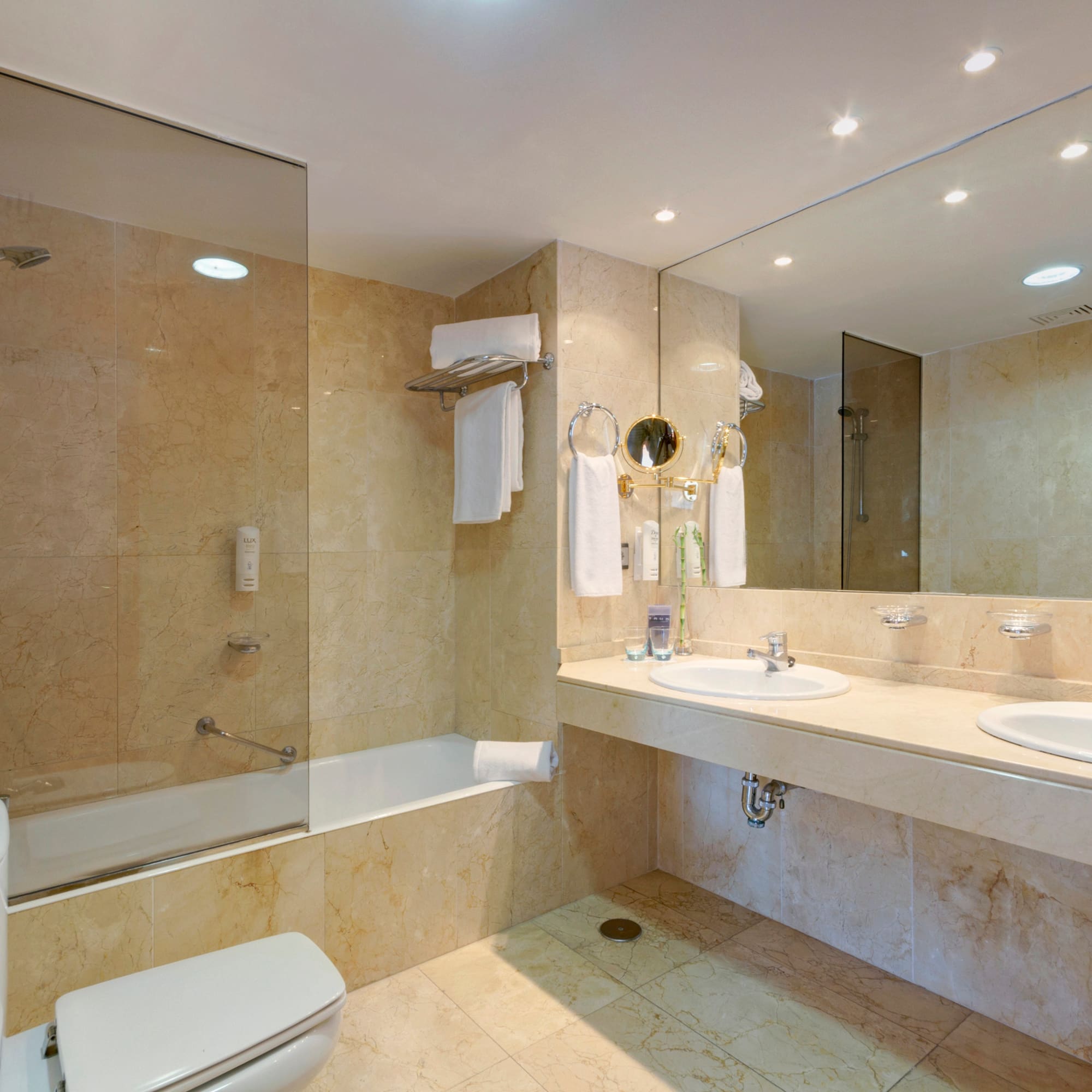 a bathroom with a shower and sink