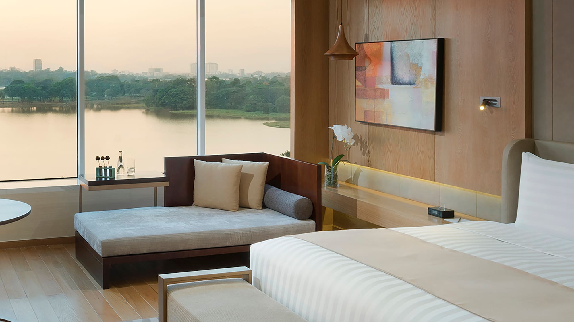 a room with a bed and couches