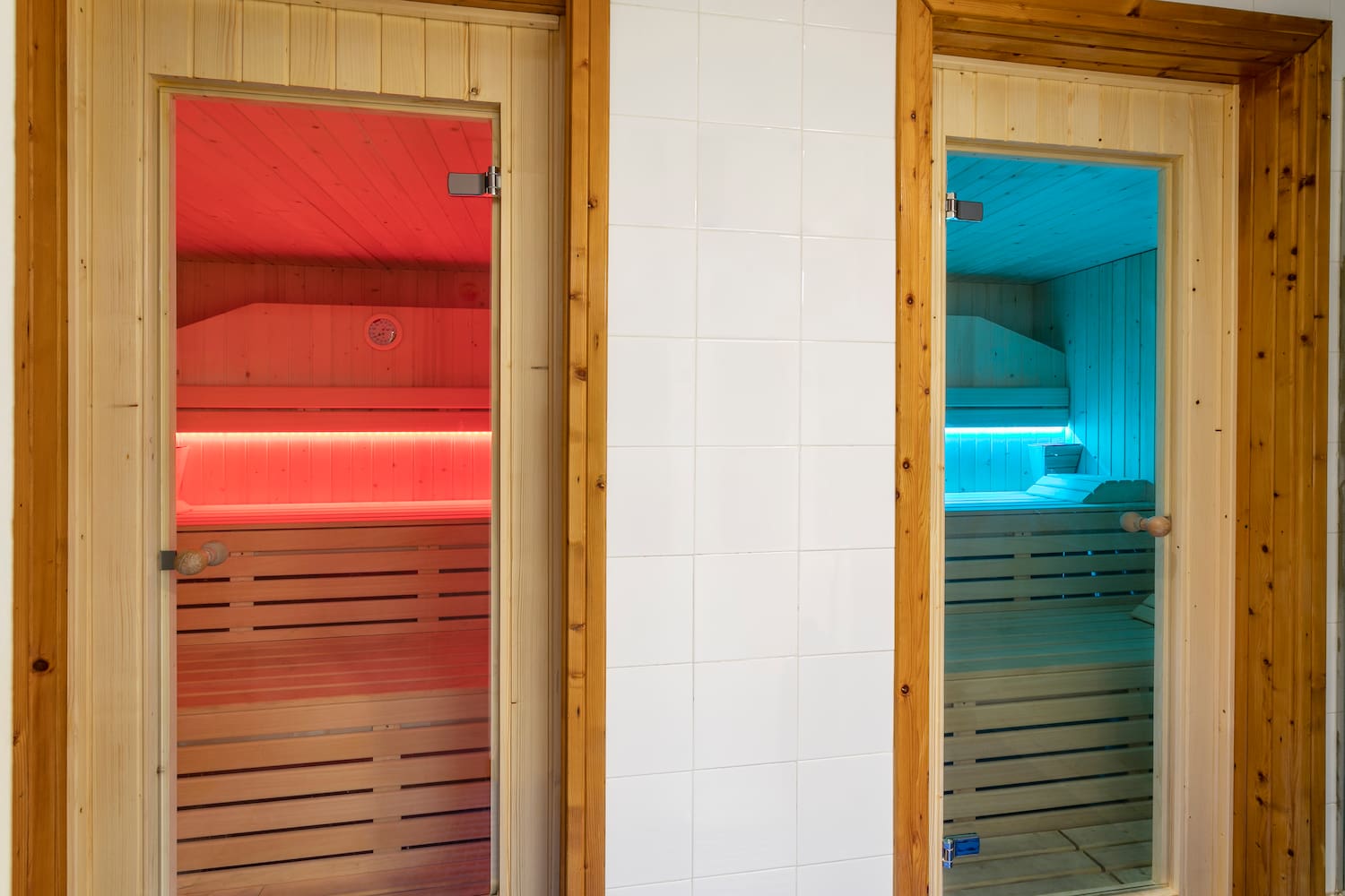 a two doors of a sauna