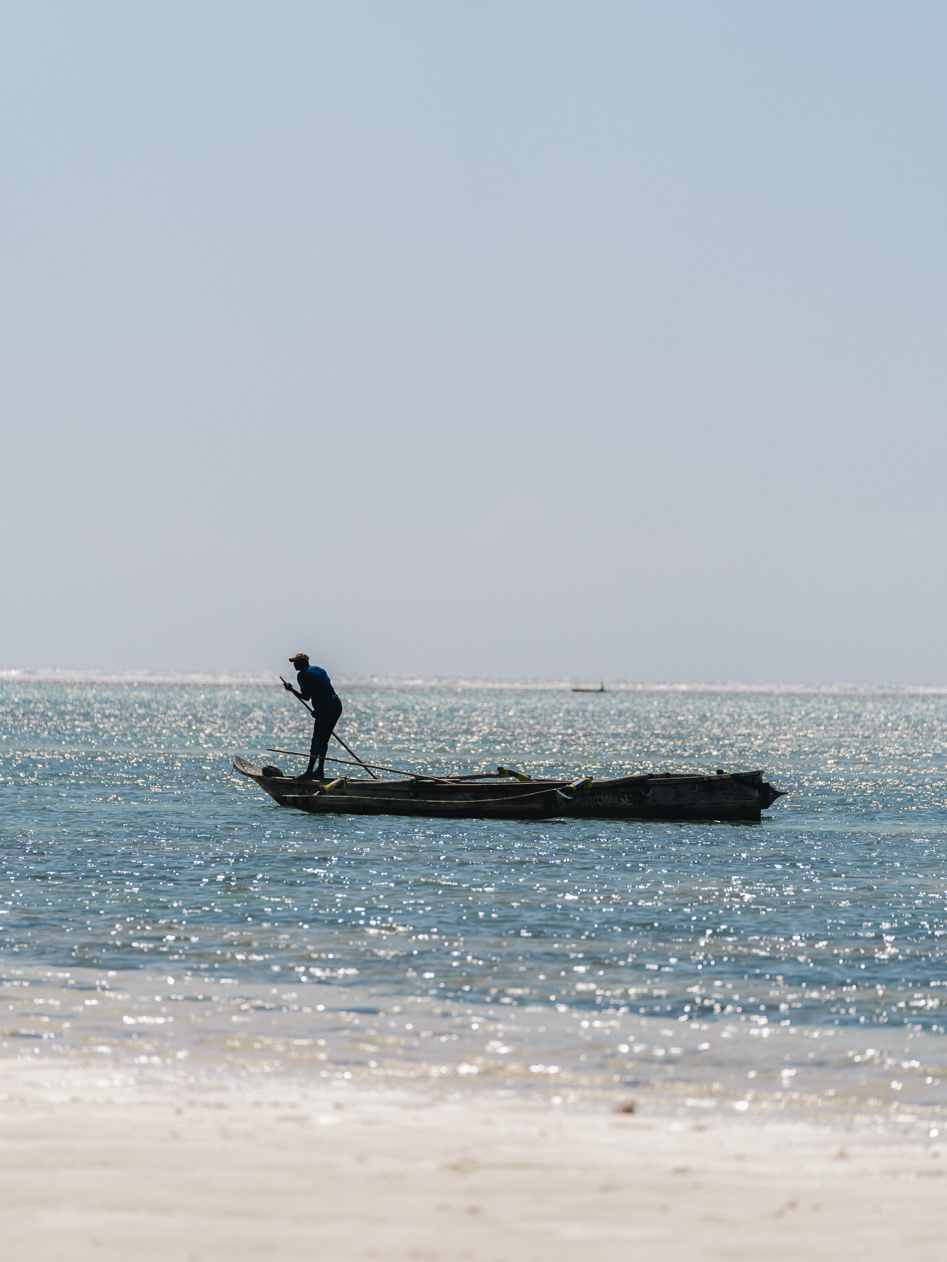 a person on a boat in the ocean