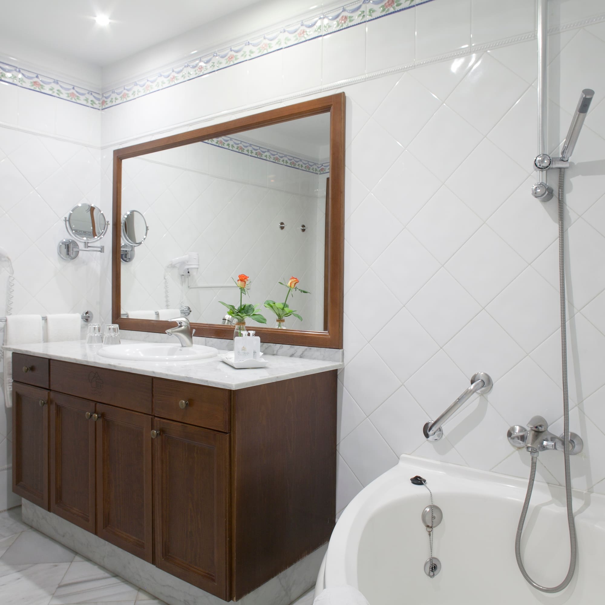 a bathroom with a bathtub and sink