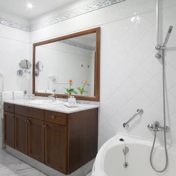 a bathroom with a bathtub and sink