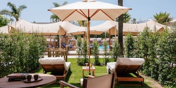 chairs and umbrellas on a patio