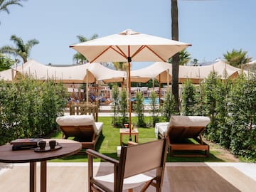 chairs and umbrellas on a patio