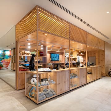 a store with glass walls and shelves