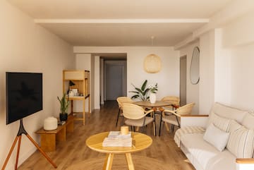 a living room with a couch and table