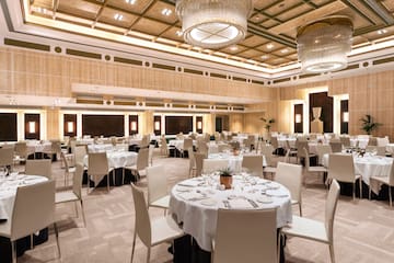 a large room with tables and chairs