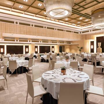 a large room with tables and chairs