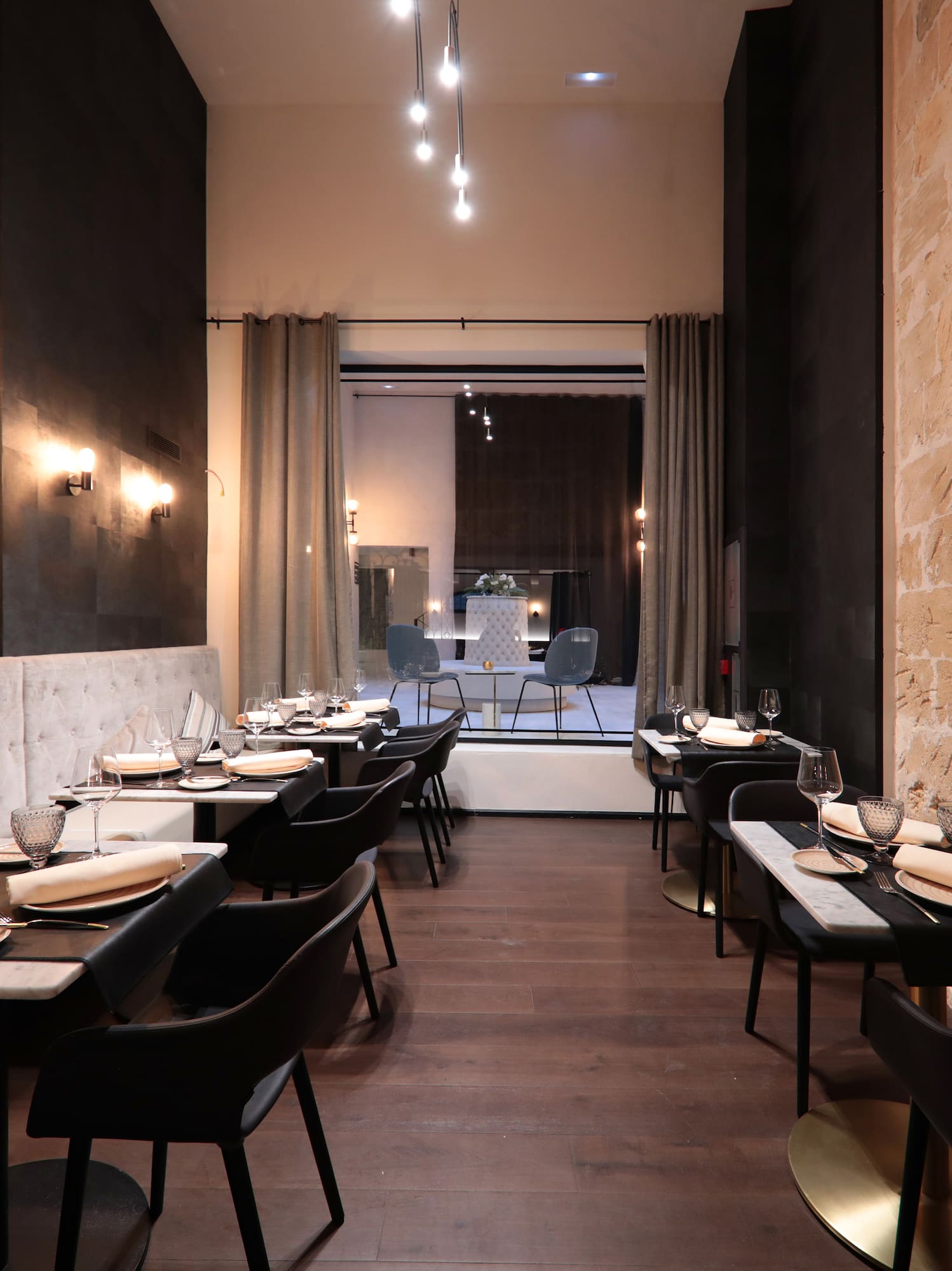 a restaurant with tables and chairs