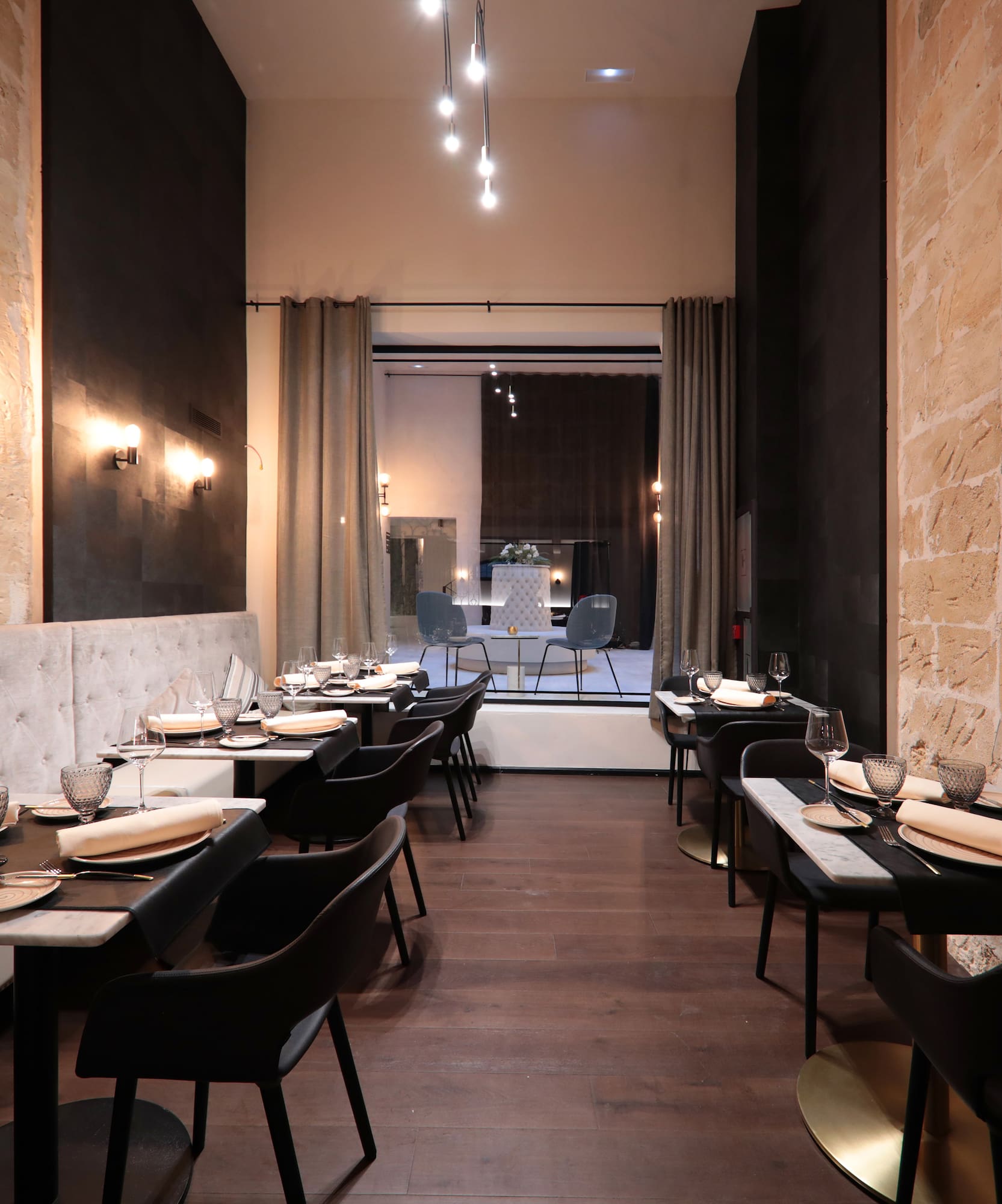 a restaurant with tables and chairs