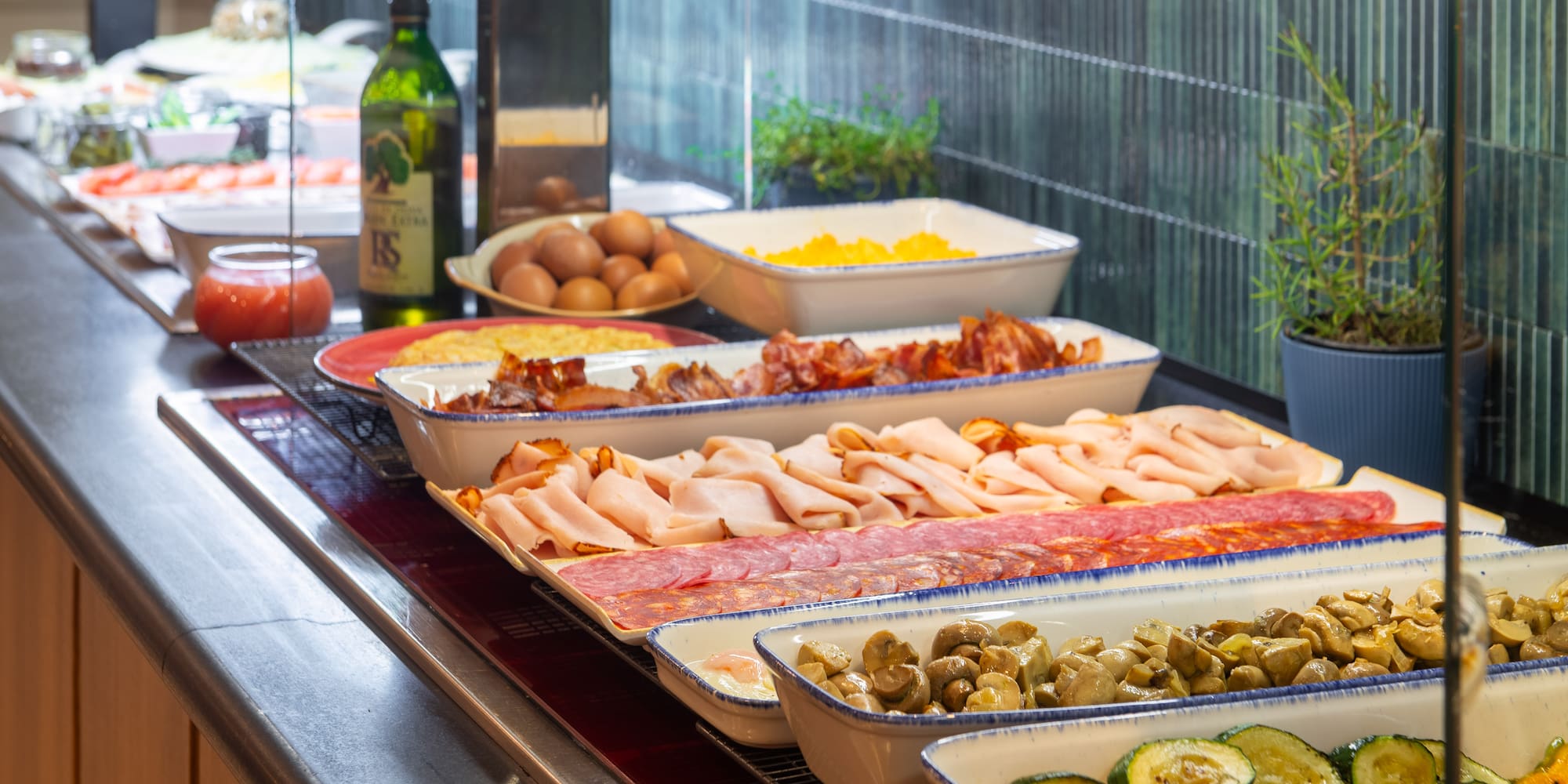 a trays of food on a counter