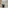 Modern hotel bathroom with floating vanity, vessel sink, glass shower, and toilet.