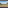 Safari lodge balcony view of vast African savanna with scattered trees and hills.