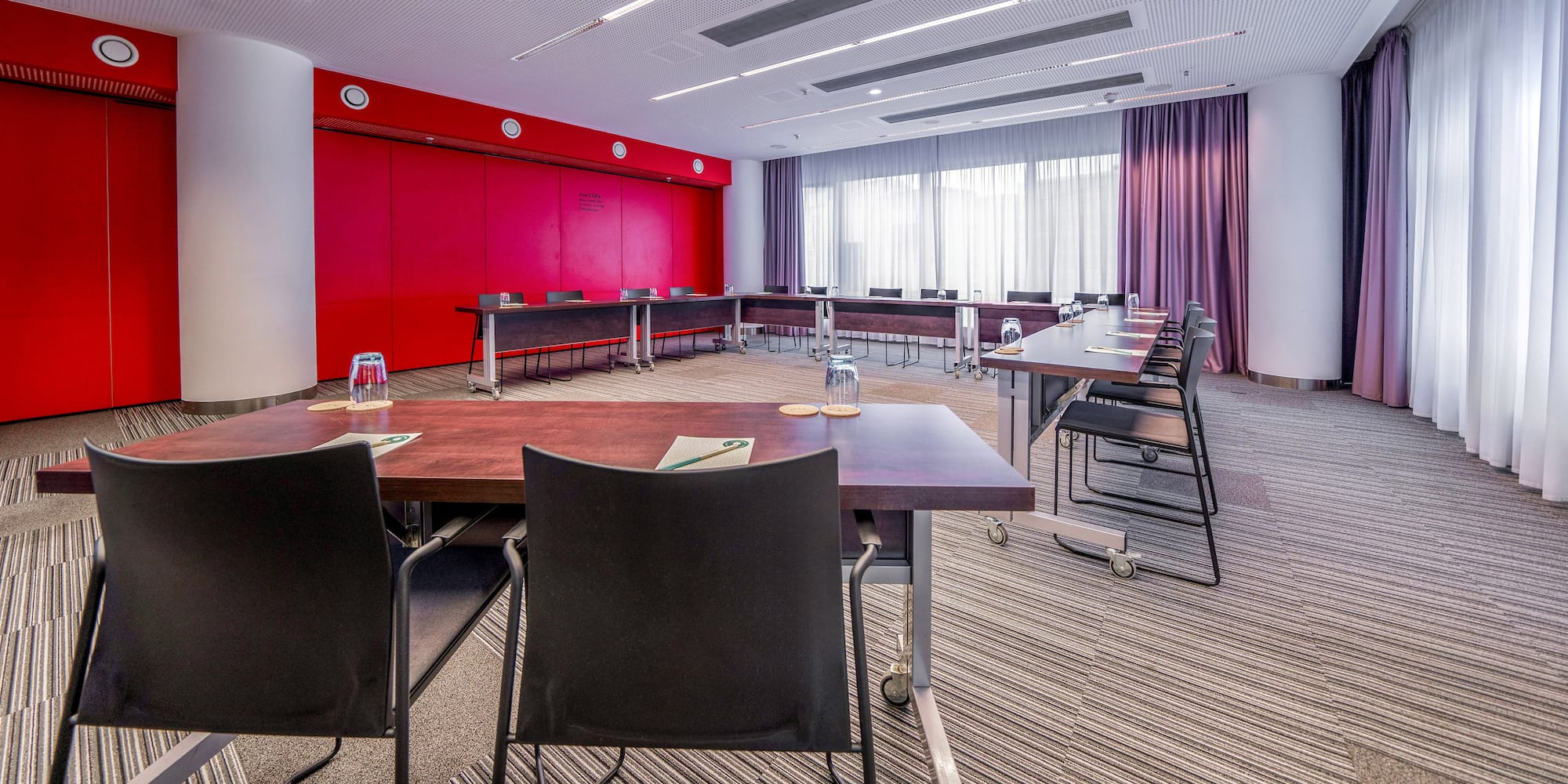 a room with tables and chairs