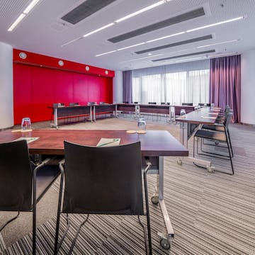 a room with tables and chairs