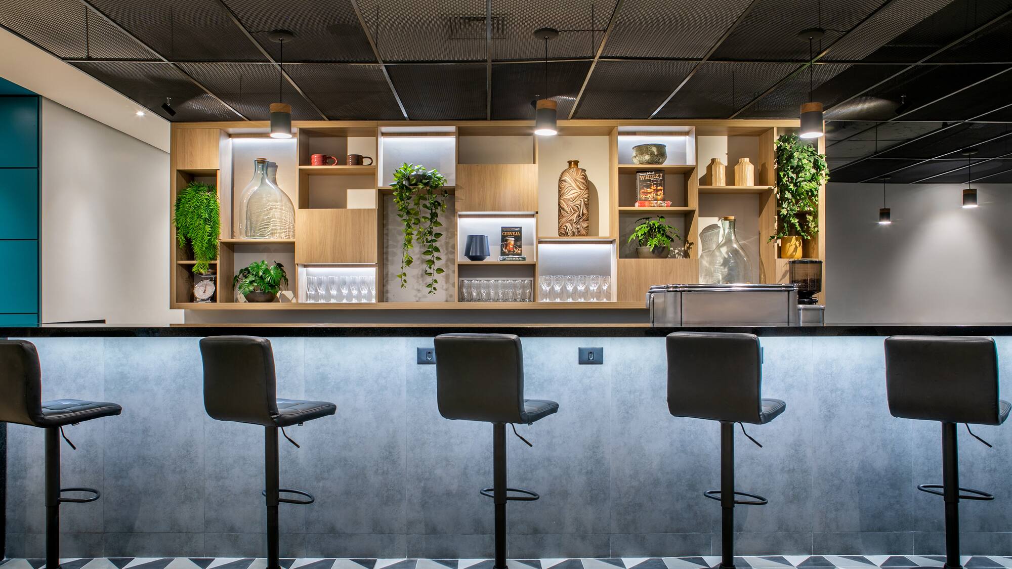 a bar with stools and shelves