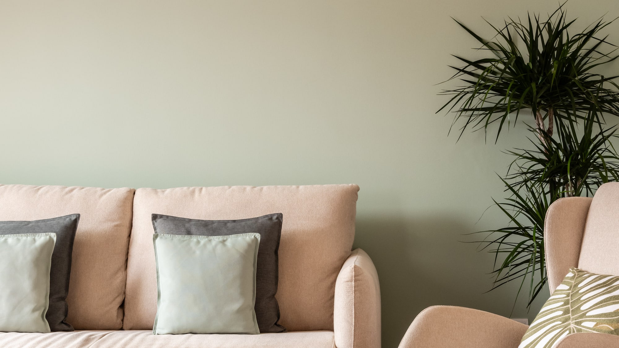 a couch and chair in a room