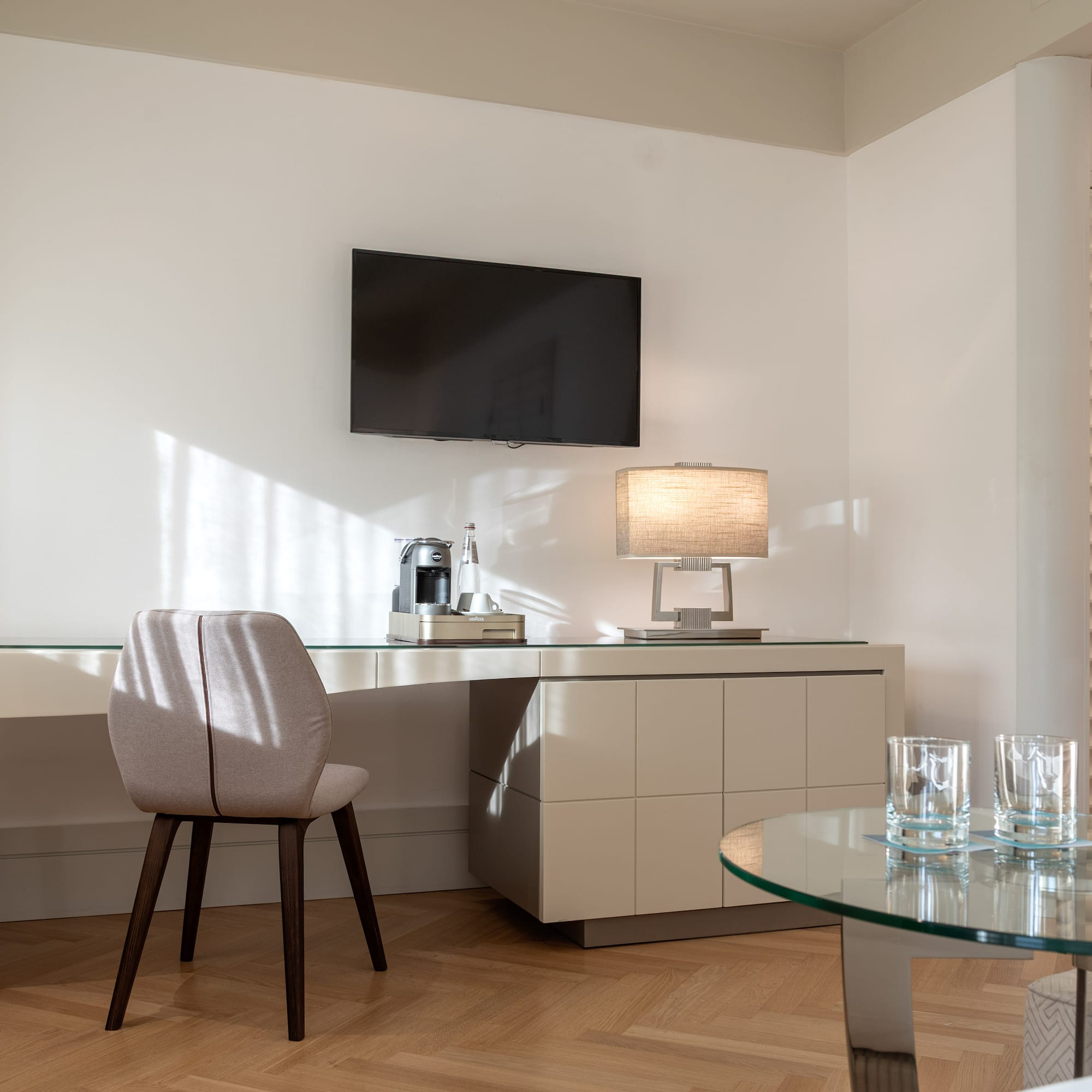 a room with a table and a tv