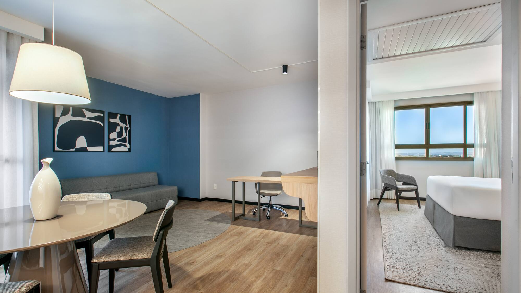 a room with a table and chairs