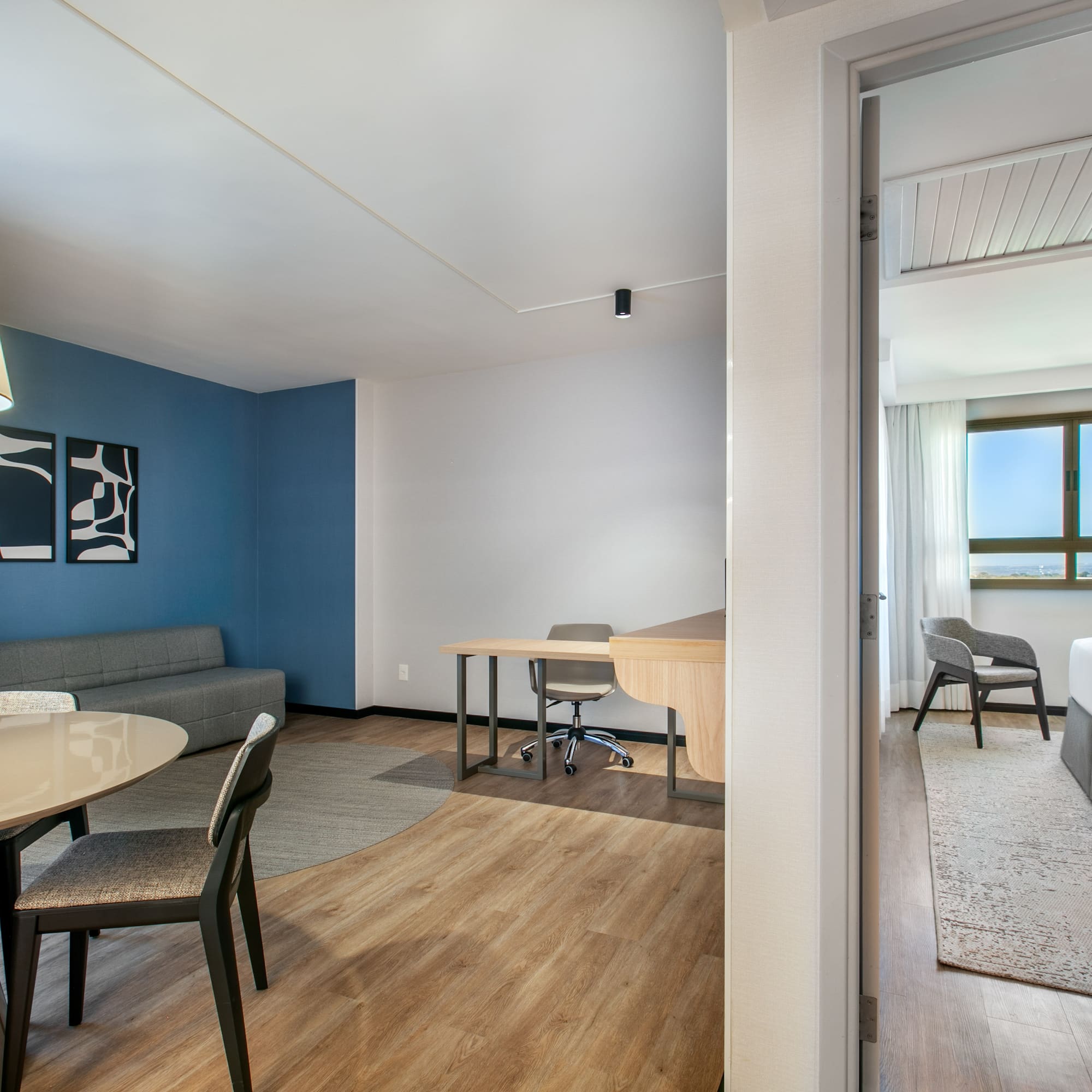 a room with a table and chairs