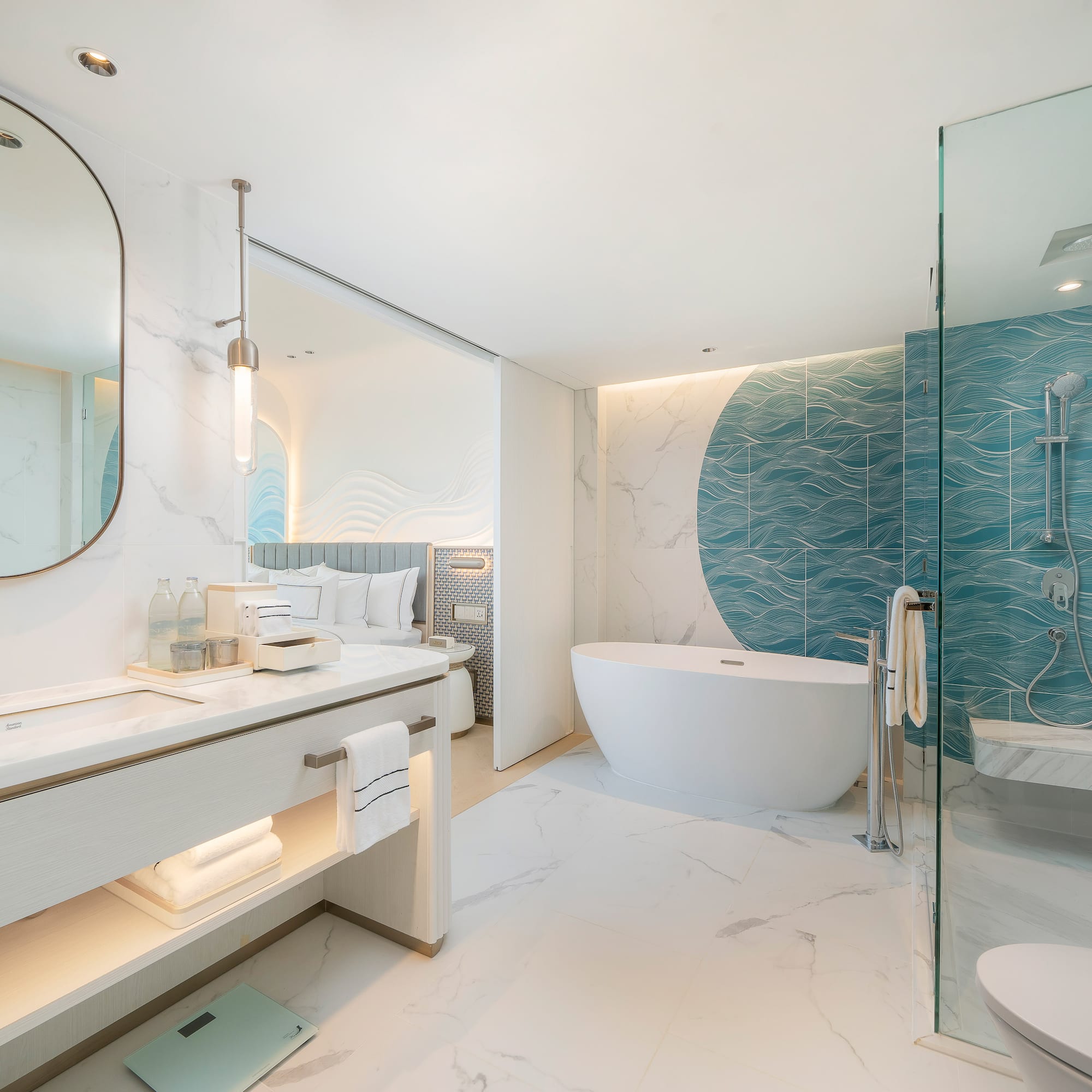 a bathroom with a tub and a shower