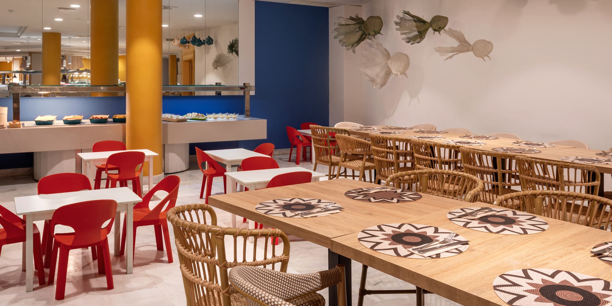 Hotel buffet restaurant with modern decor and family-friendly seating.