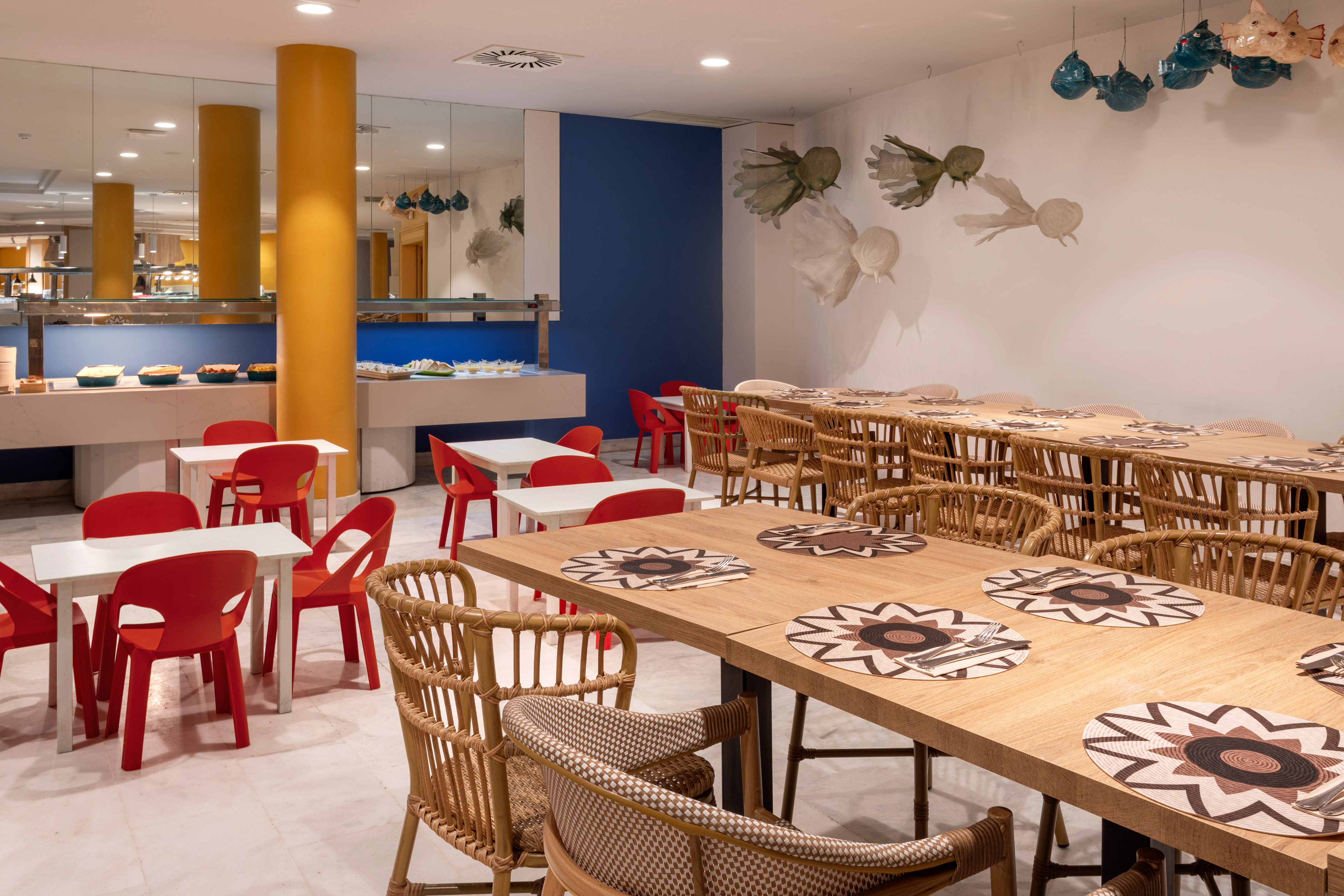 Hotel buffet restaurant with modern decor and family-friendly seating.