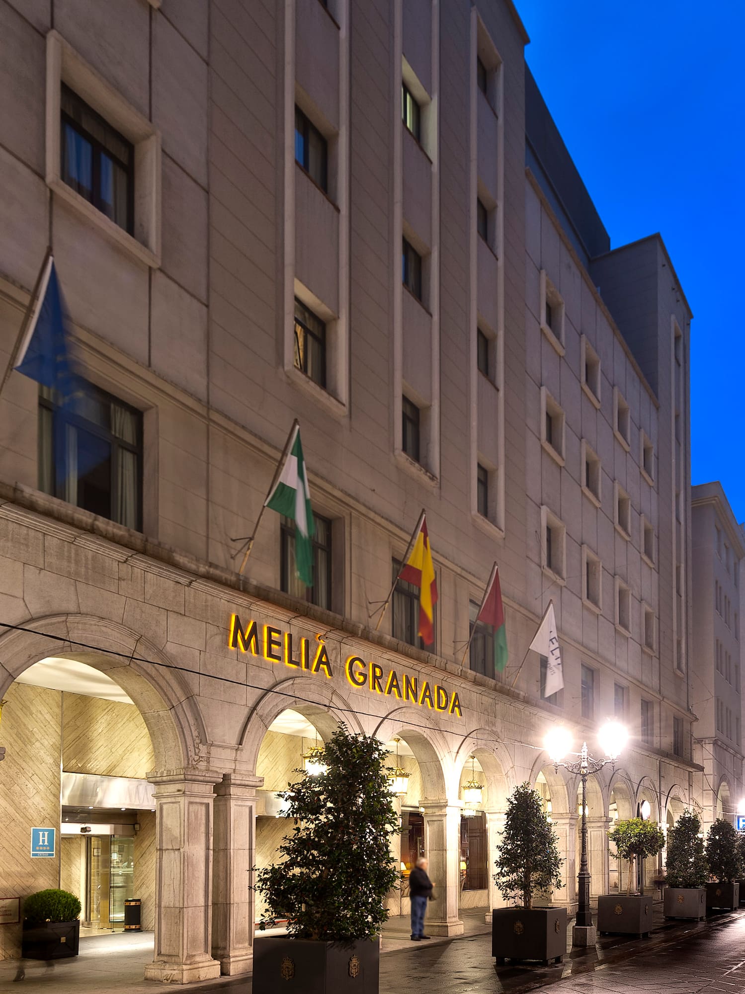 a building with flags on the front